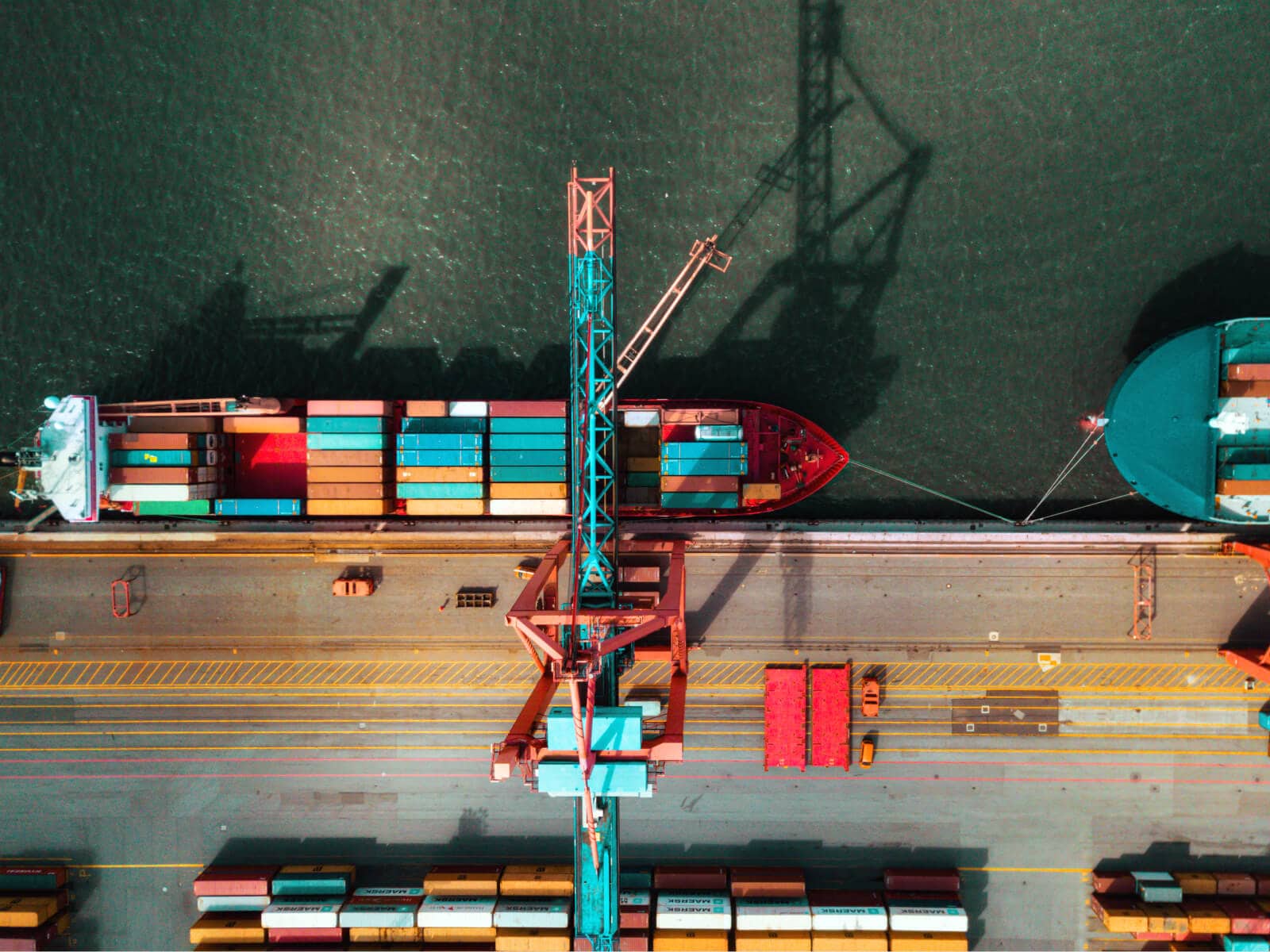 Overhead view of a cargo ship with containers in port